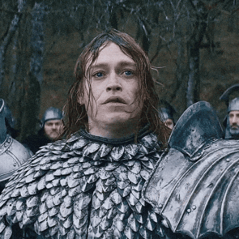 Man with Long Red Hair in Armor and Helmet