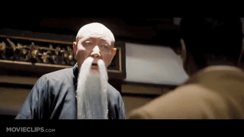 Man With Long White Beard Talking To Another Man Movieclips.com GIF