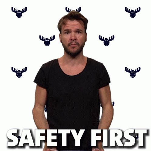 Man With Mask on Head Saying Safety First