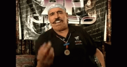 Man With Medal At WWF Sign GIF