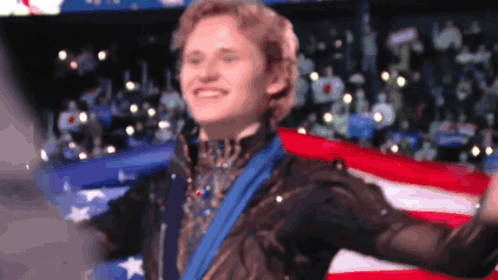 Man with Medal in Front of American Flag