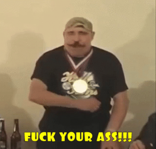 Man With Medal Says Fuck Your Ass