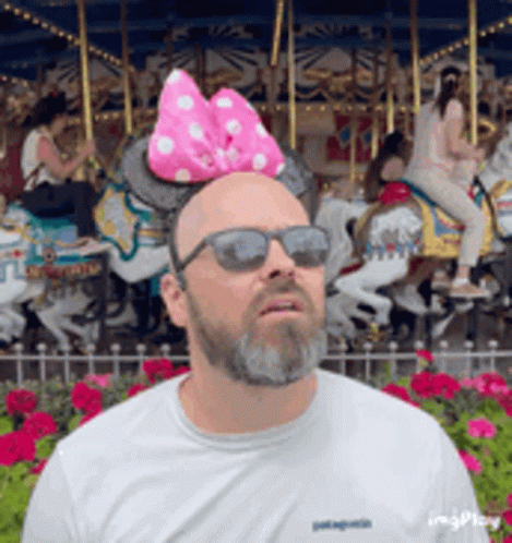 Man with Minnie Mouse Headband and Sunglasses