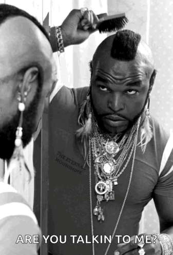 Man With Mohawk Brushing Hair Are You Talkin To Me GIF