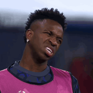 Man With Mohawk Making Funny Face In Pink Vest GIF