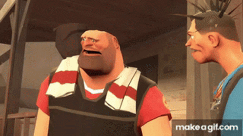 Man With Mohawk Talking to Another Man