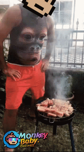 Man with Monkey Face Shirt Grilling Meat