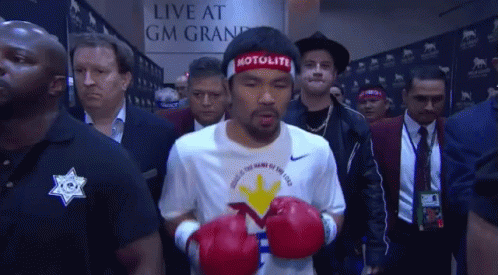 Man With Motolite Headband Walks Through Crowd