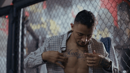 Man With Muaythai Chest Tattoo GIF