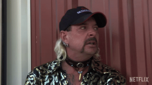 Man with Mullet and Seattle Hat