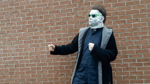 Man With Mullet Sitting at Table Saying Finally Motherfucker