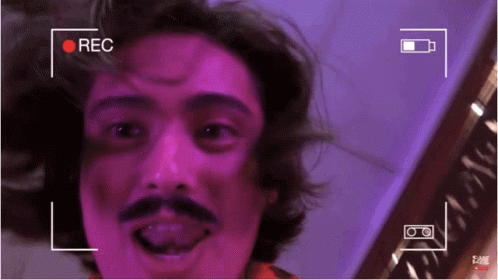 Man With Mustache And Tongue Out GIF