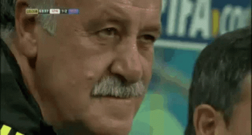 Man with Mustache and Uruguay Scoreboard