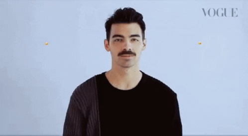 Man With Mustache Blowing Kiss With Two Emojis GIF