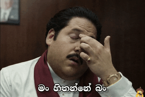 Man With Mustache Covering Face Saying Foreign Language GIF