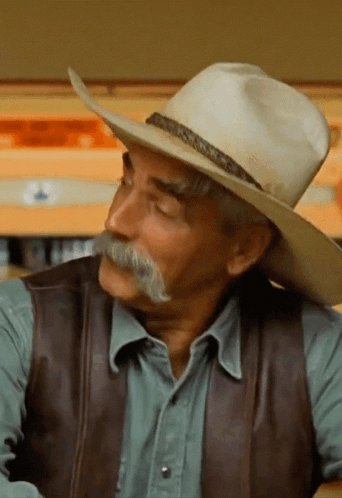 Man with Mustache Cowboy Hat Leather Vest