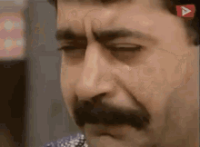 Man with Mustache Crying
