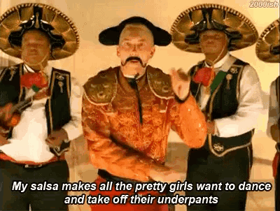 Man with Mustache Dancing in Front of Mariachi