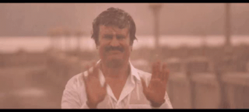 Man With Mustache Funny Face In Rain GIF
