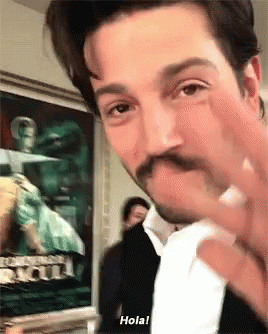 Man With Mustache Giving Middle Finger Says Hola
