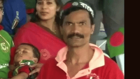 Man With Mustache Holding Baby GIF