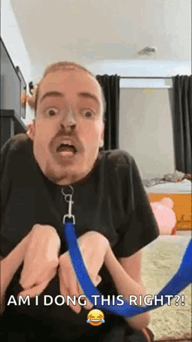 Man With Mustache Holding Blue Leash GIF