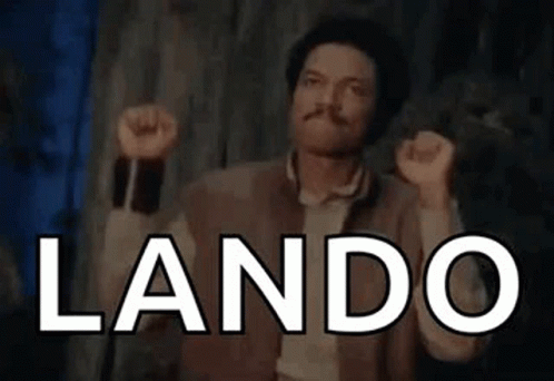 Man with Mustache Holding Fists Up