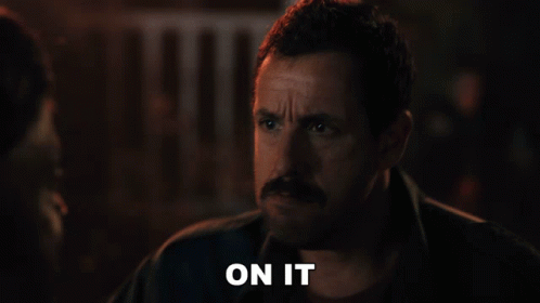 Man with Mustache Holding Forehead