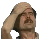 Man with Mustache Holding Head