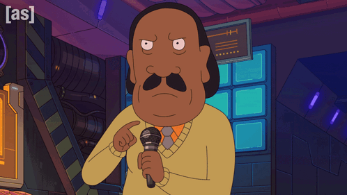 Man With Mustache Holding Microphone In Front Of As Sign GIF
