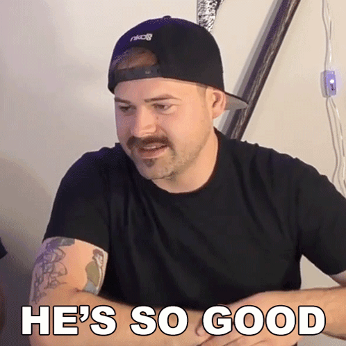 Man With Mustache In Black Hat And Shirt Saying He's So Good GIF