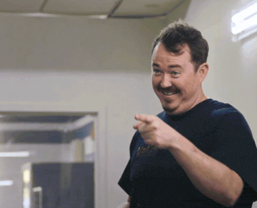 Man With Mustache in Black Shirt Saying Valley