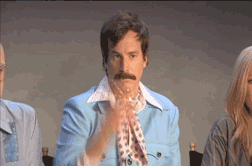 Man With Mustache in Blue Jacket and Scarf