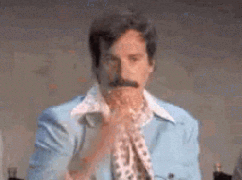 Man With Mustache In Blue Suit And White Shirt GIF