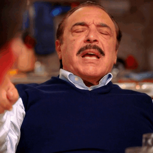Man With Mustache In Blue Sweater Crying GIF