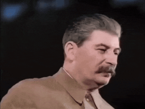Man With Mustache In Brown Suit And Tie GIF