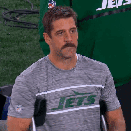 Man With Mustache in Jets Shirt and Wheelchair