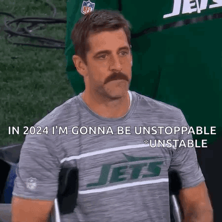 Man With Mustache in Jets Shirt in Wheelchair