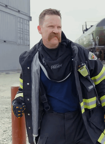 Man with Mustache in Prevent Jacket