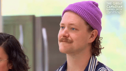 Man With Mustache In Purple Beanie GIF