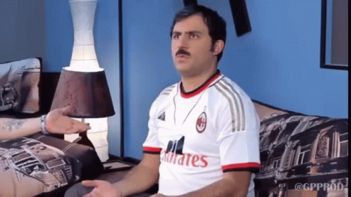 Man With Mustache In White Emirates Shirt GIF