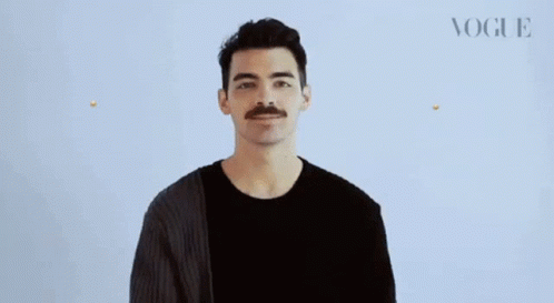 Man With Mustache Laughing Tears GIF