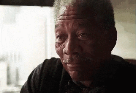 Man With Mustache Looking At Camera GIF