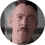Man with Mustache Looking at Camera