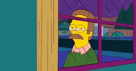 Man with Mustache Looking Out Window at Night