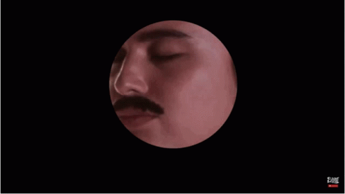 Man With Mustache Looking Through Telescope GIF