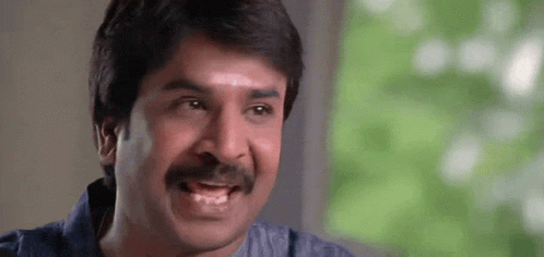 Man With Mustache Making Funny Face at Camera