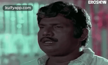 Man With Mustache Making Funny Face GIF
