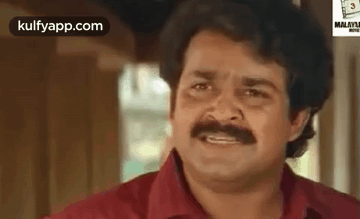Man With Mustache Making Funny Face GIF