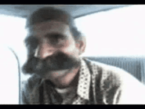 Man with Mustache Making Funny Face